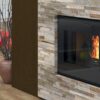 Stufa a pellet idro Orion Linea VZ con frontale nero personalizzabile